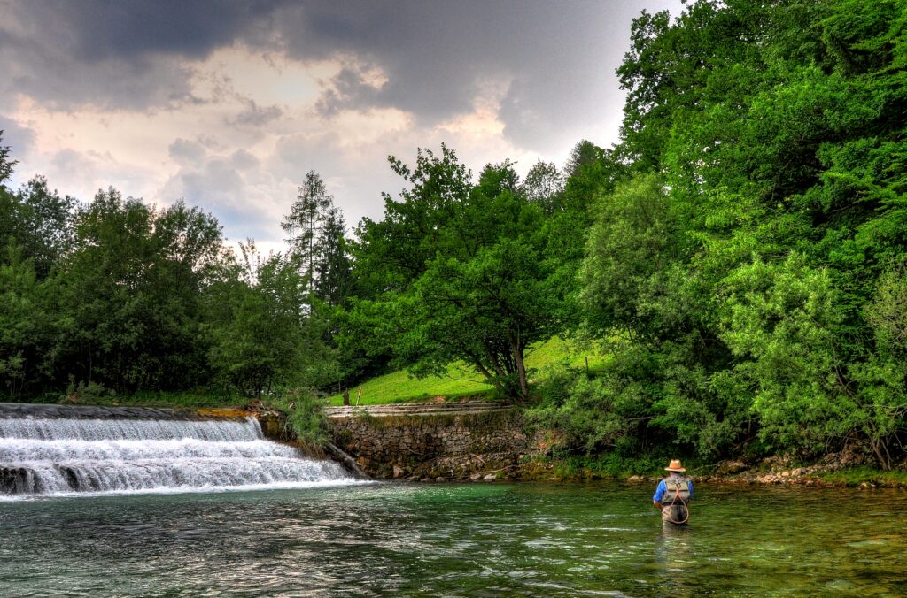 Fisherman on the Radovna river, Slovenia