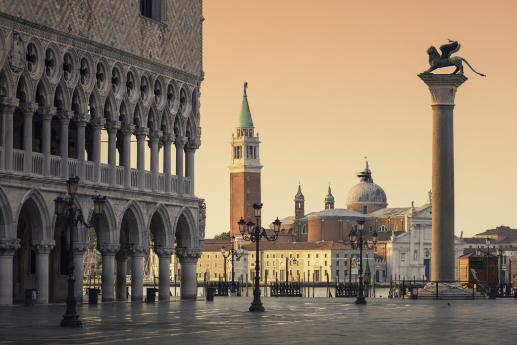 Morning on Piazza San Marco in Venice, next to the Doge's Palace. In the background is the San Giorgio Maggiore church, and on the right the Column of St Marco.