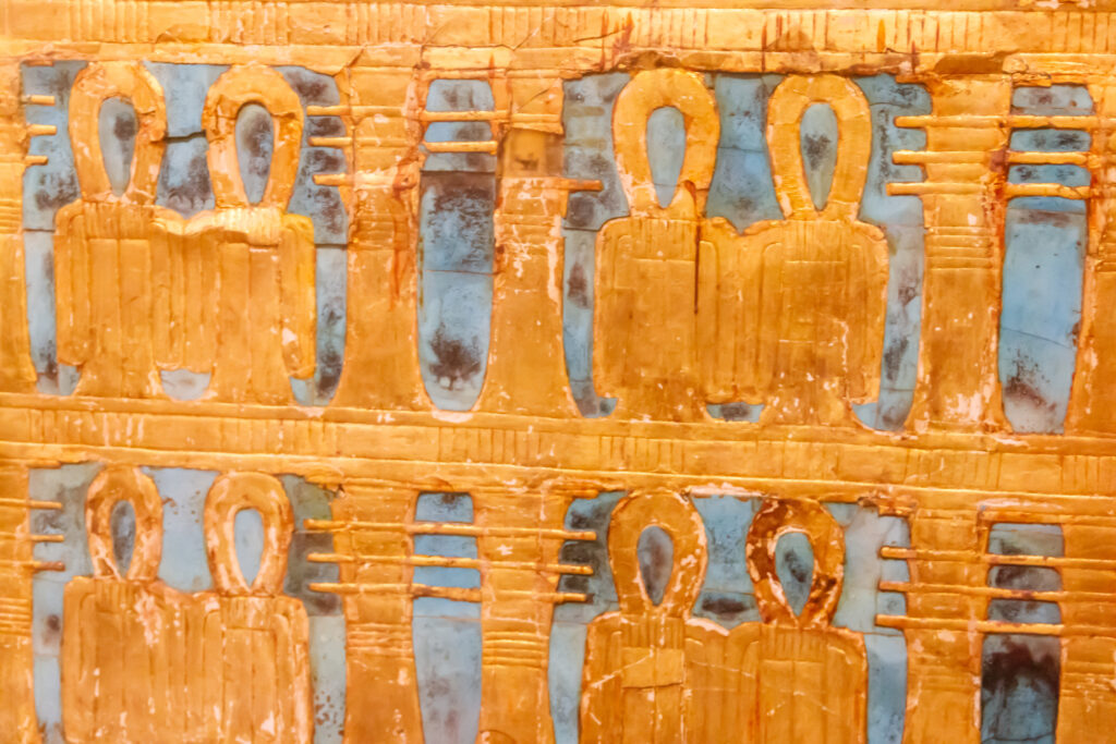 Close-up of outer golden shrine of famous Egyptian pharaoh Tutankhamun’s burial chamber