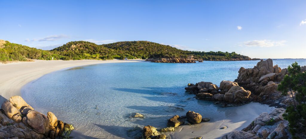 Shallow, clear waters at the Spiaggia del Principe, one of the most beautiful beaches in Costa Smeralda in the northeast coast of Sardinia (7 shots stitched)