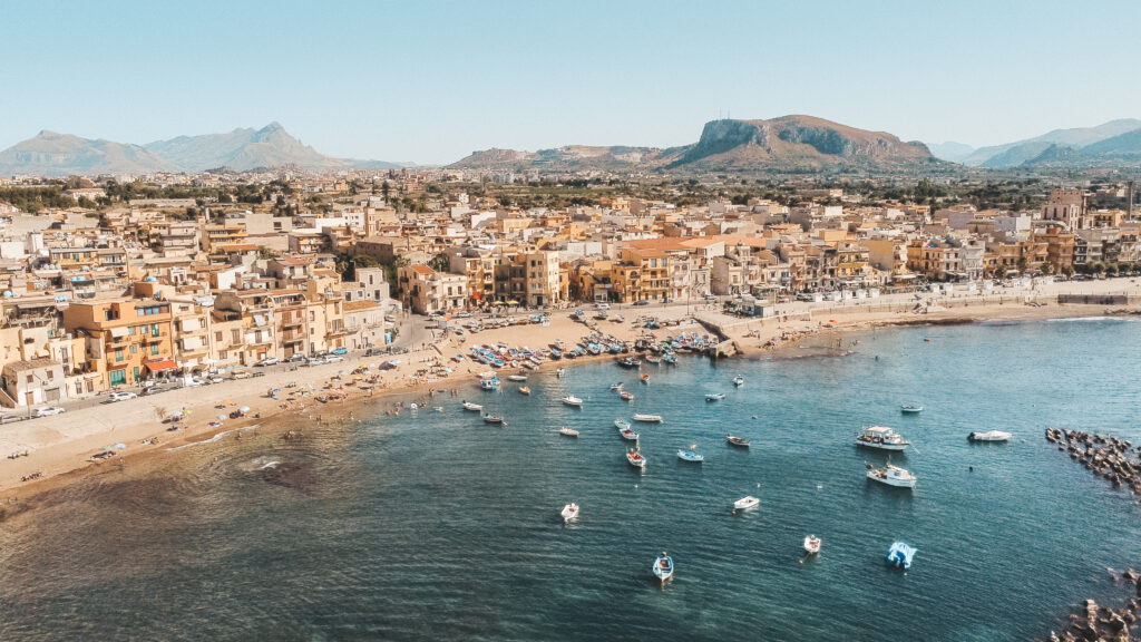 An aerial panoramic shot of the Tyrrhenian Sea from Cefalu in Sicily, Italy