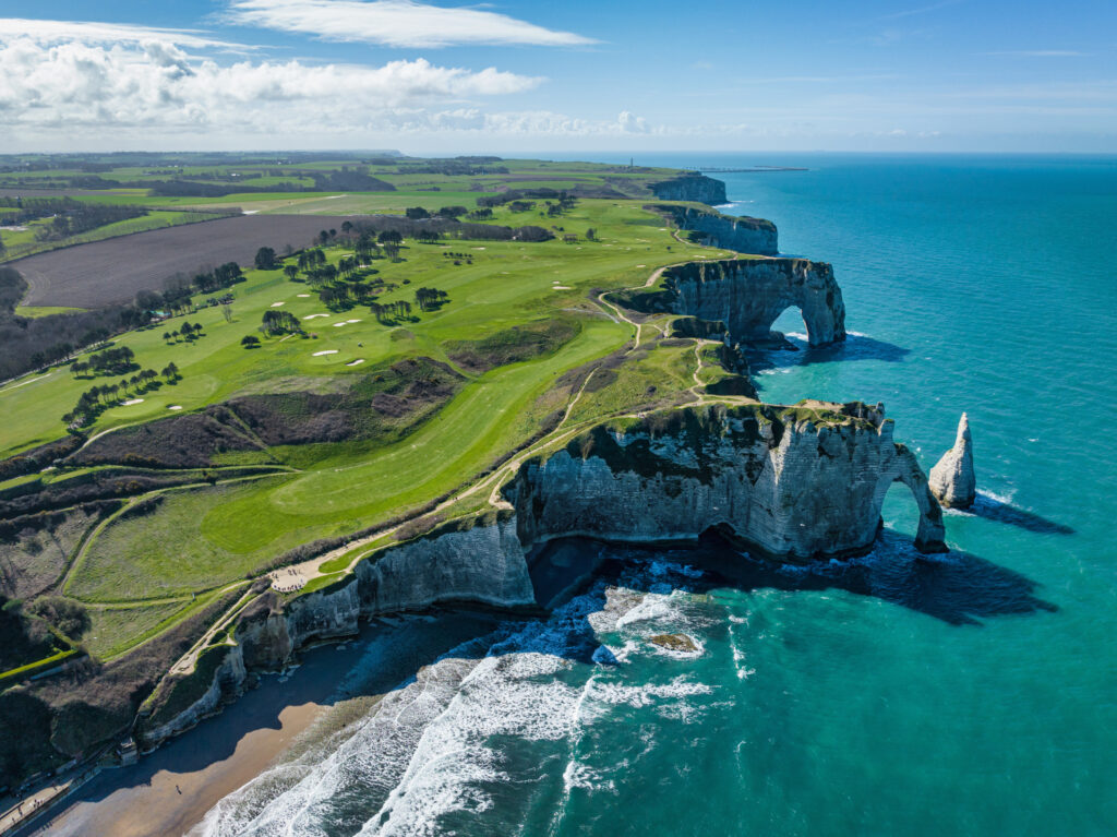 Étretat Coast Normandy, aerial view towards the beach and famous Chalk Cliffs of Etretat 