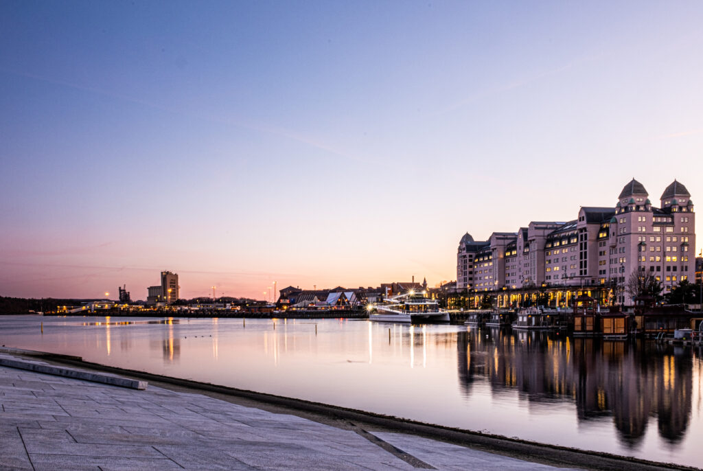 The twin towered town hall in Oslo, Norway at sunset.