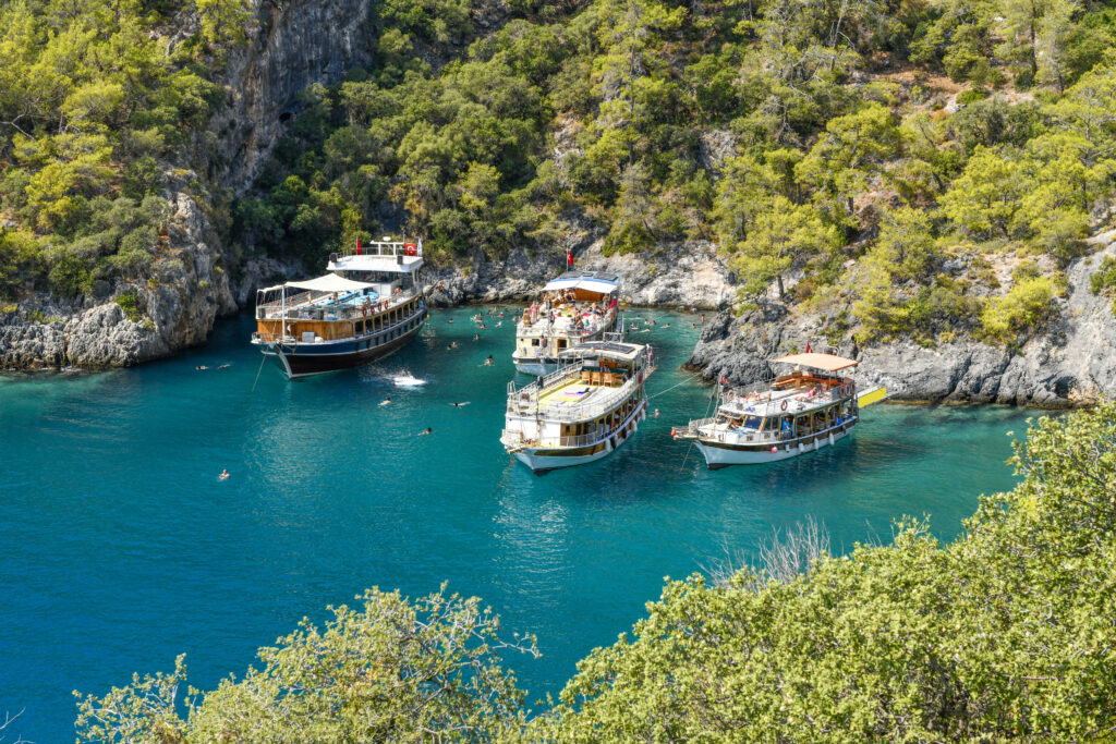 Yachts in Soğuksu Bay in Ölüdeniz. Ölüdeniz is in Turkey.