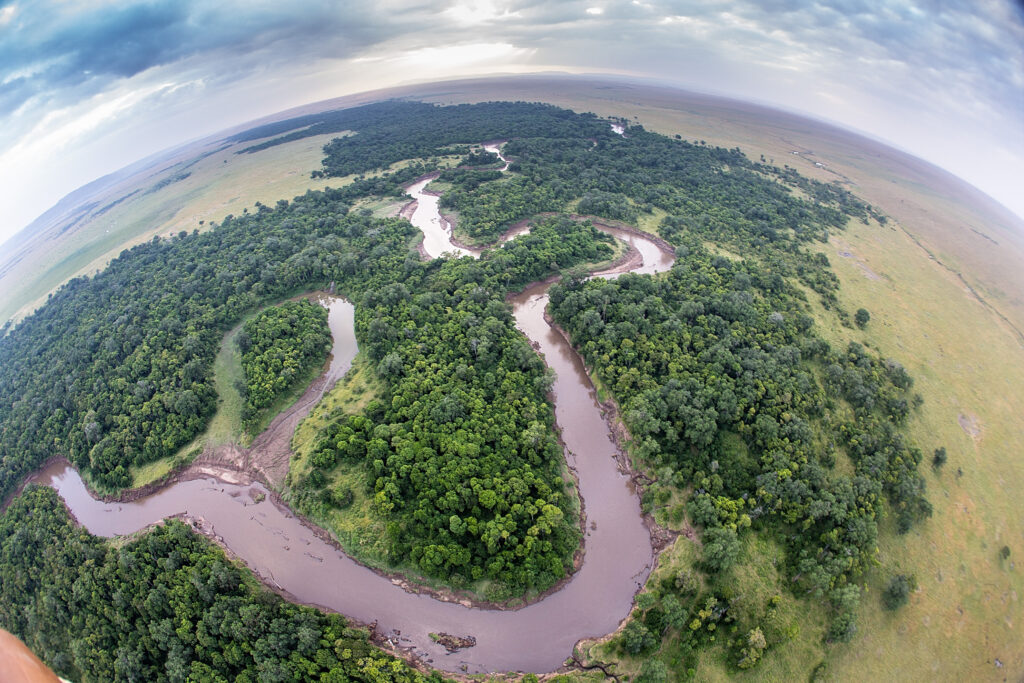 Fish eye shot from  hot air balloon over Masai Mara -Mara river Kenia