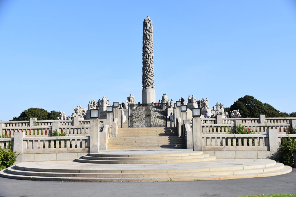 Stone stairs and a large carved column, in Vigeland Park, Oslo