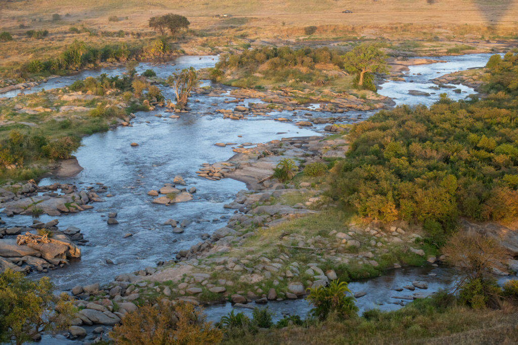 The Mara from above – the Mara river seen from above aboard a hot air balloon, beautiful morning light at dawn