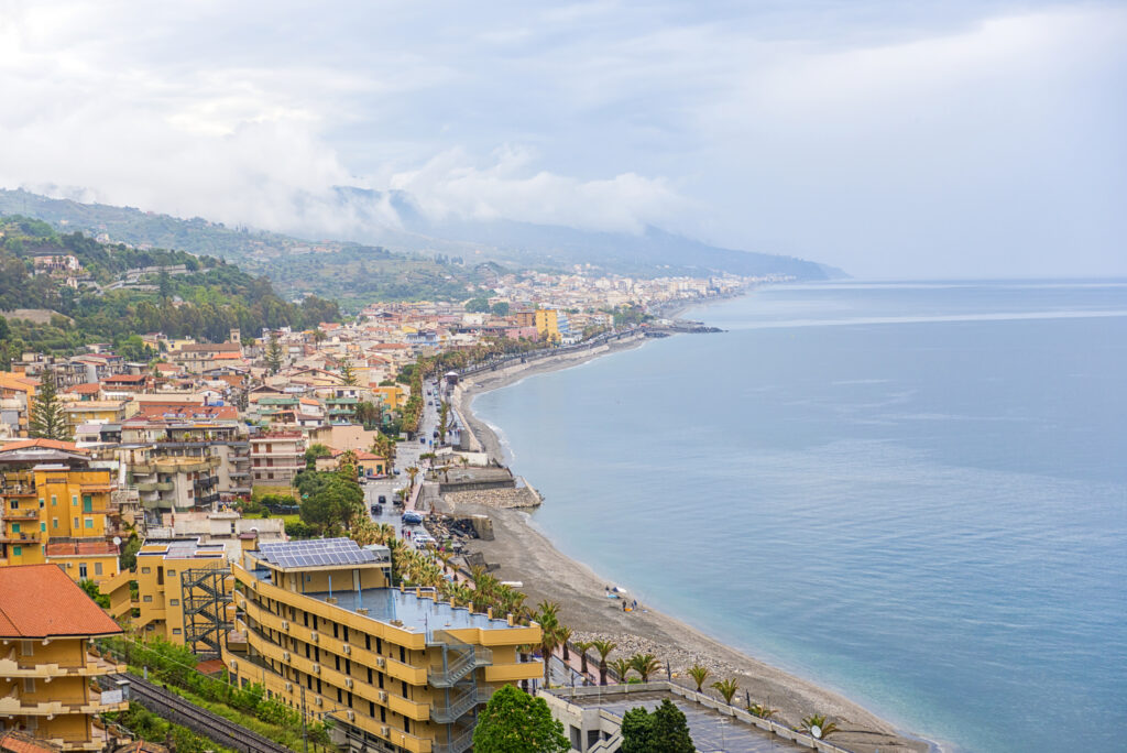 Aerial view on coast town at the Ionian sea of Sicily. Italy.