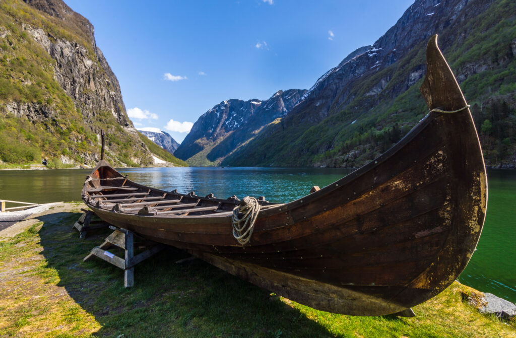 Viking Ship resting alongside Gudvangen Fjord in Norway.