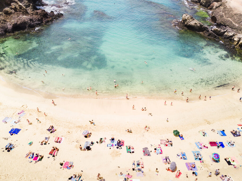 Aerial view of people at Papagayo beach in Lanzarote