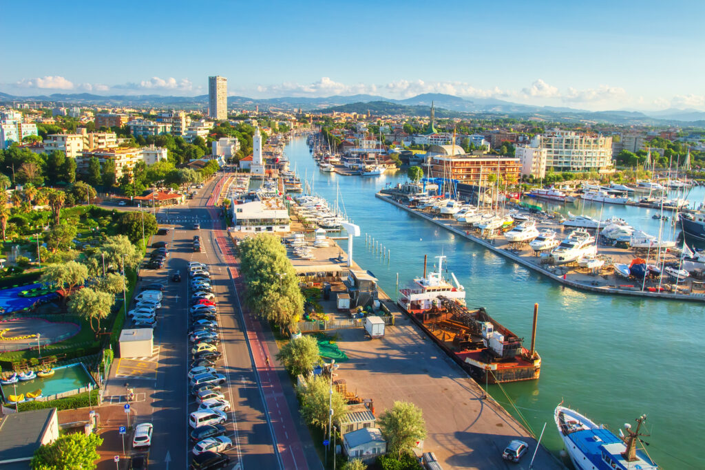 Aerial view on Rimini. Italian cityscape from above. Lighthouse on water sea canal. Rimini city. Summer vacation