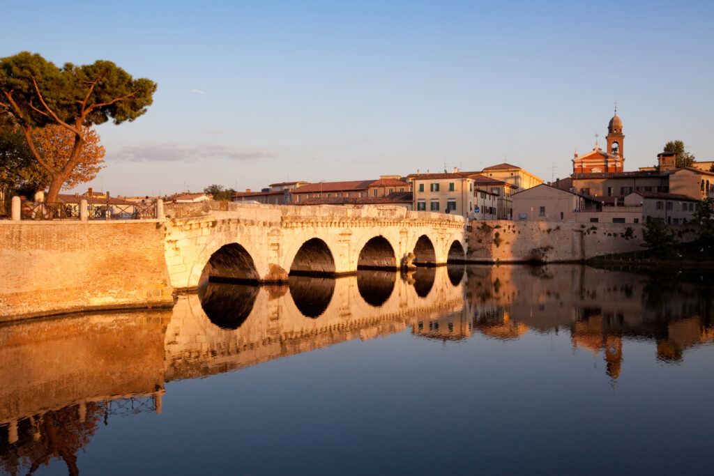 This Italian landmark architecture was constructed by the Romans in the 1st century a.C. The five-arched bridge is still in use for the lively traffic in town.