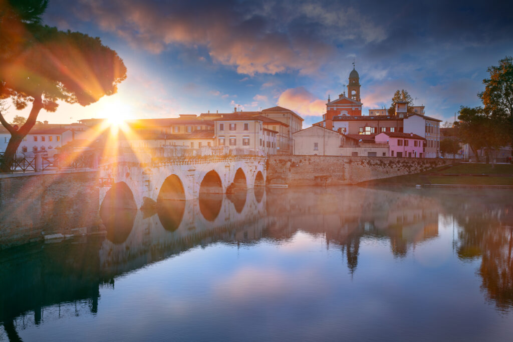 Cityscape image of historical center of Rimini, Italy at sunrise.